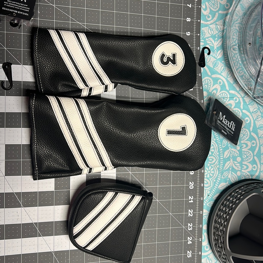 Maxfli golf covers. Set of 1,3 and putter covers. Brand new and never used.